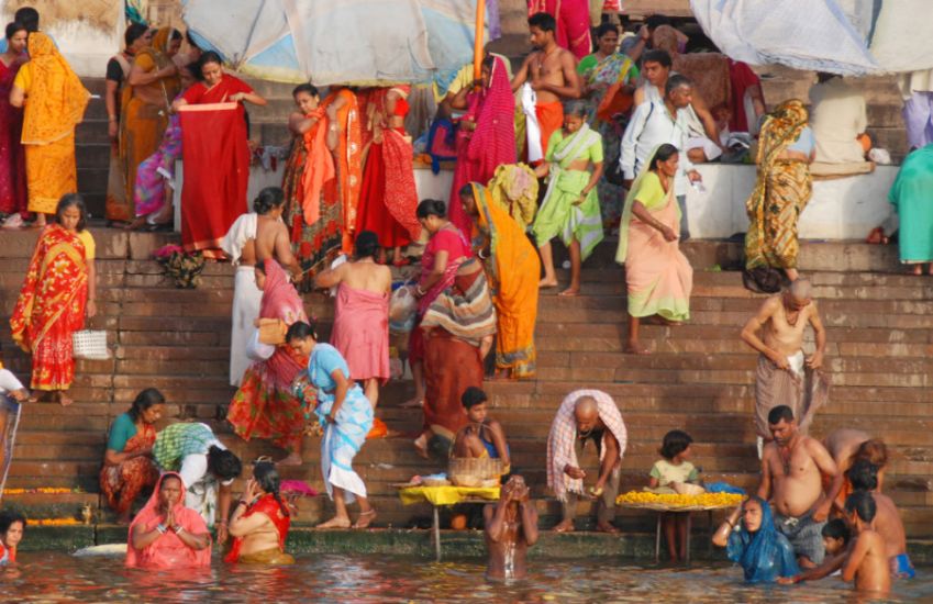 Bathing in the Ganga ( Ganges ) River at Varanasi in India