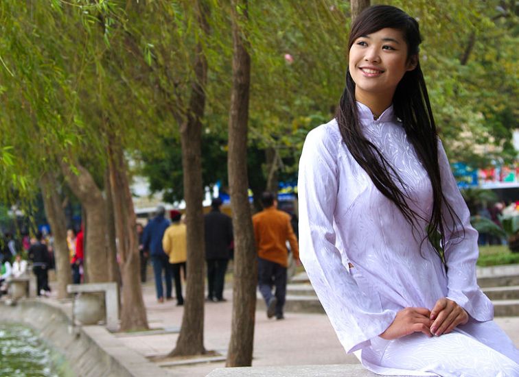 Vietnamese Girl in traditional Ao Dai dress