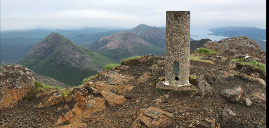 Trig Point on Blaven ( Bla Bheinn ) on Isle of Skye in Western Islands of Scotland